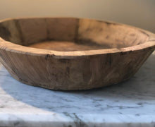 found carved wood bowl
