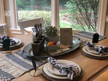 grey and cream fringed table runner